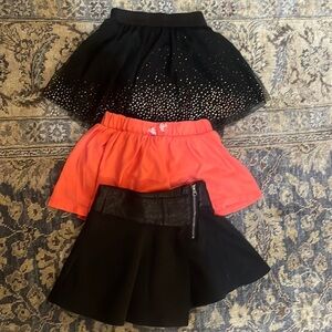 Lot of 3 little girls skirts.